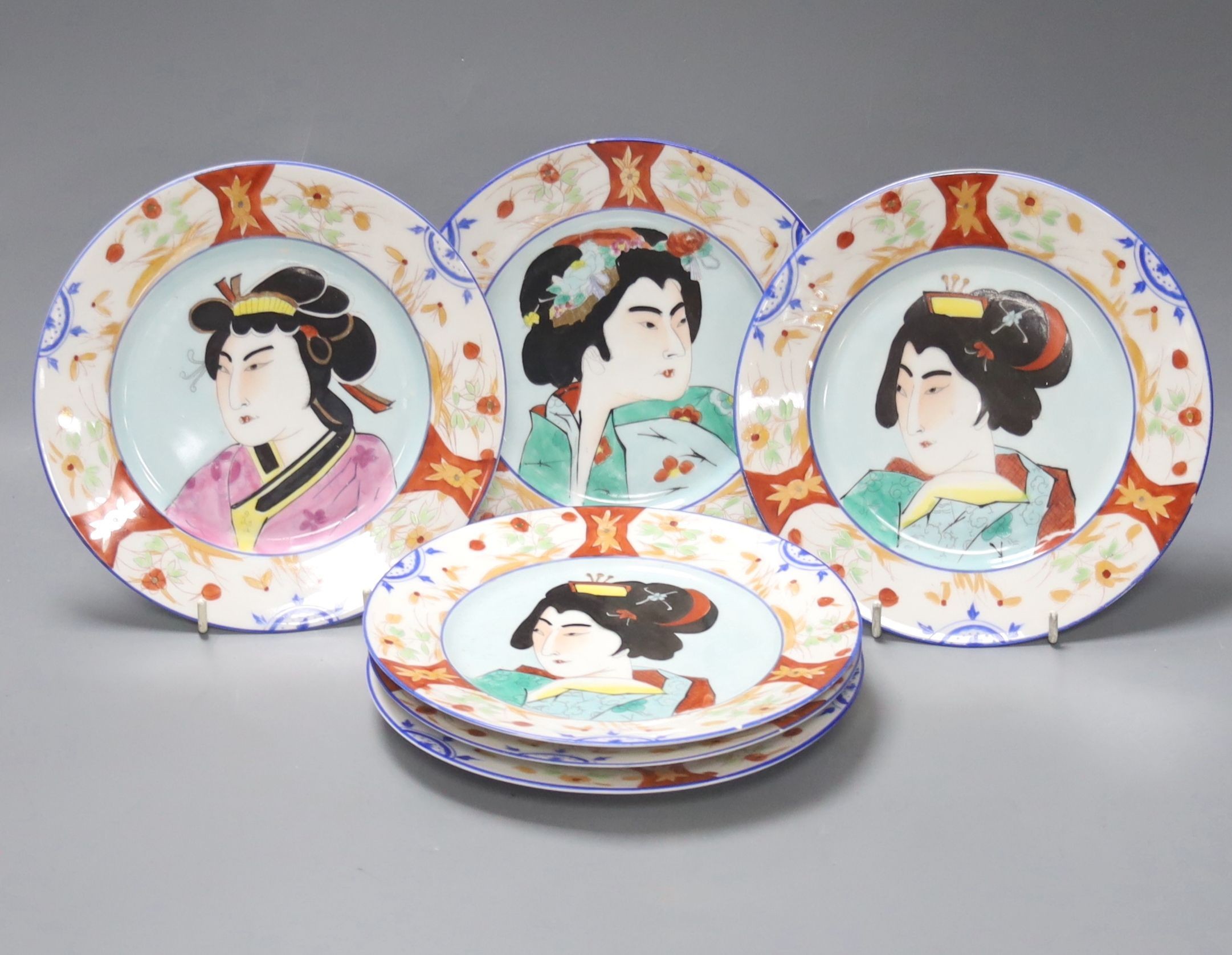 A set of six Japanese porcelain portrait plates, 20cm